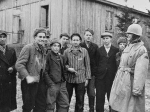 Colonel Hayden Sears poses with survivors of Ohrdruf